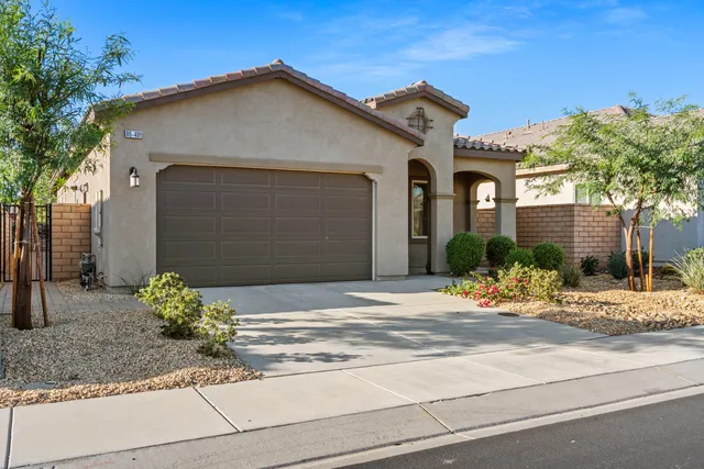 a white house with a outdoor space