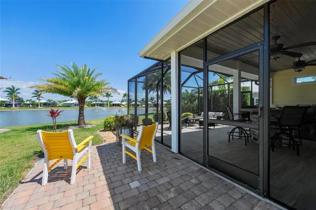 a view of a lake with a palm trees