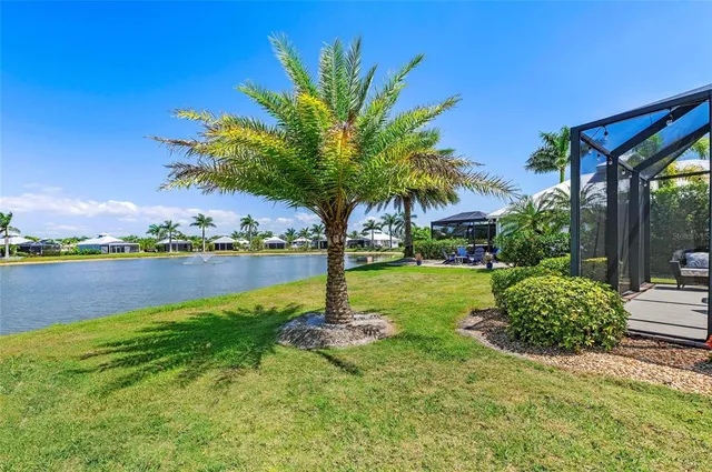 a living room with furniture a table and chairs