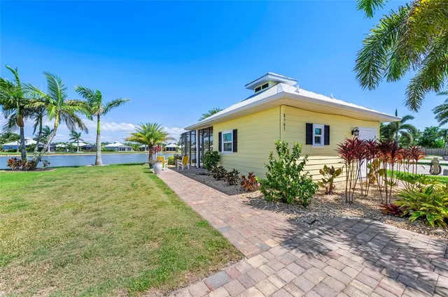 a front view of house with small garden