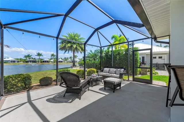 a building with outdoor seating space and garden