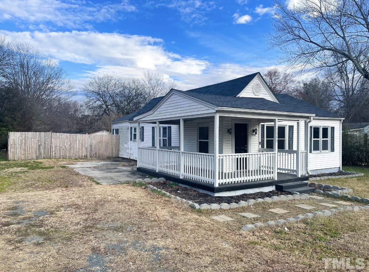 1240 Pointer Street Roxboro, NC 27573 - Photo 2 of 20 a view of a house with a yard