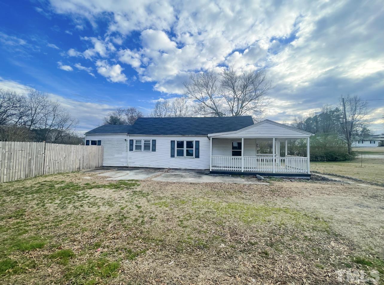 1240 Pointer Street Roxboro, NC 27573 - Photo 3 of 20 a front view of a house with garden