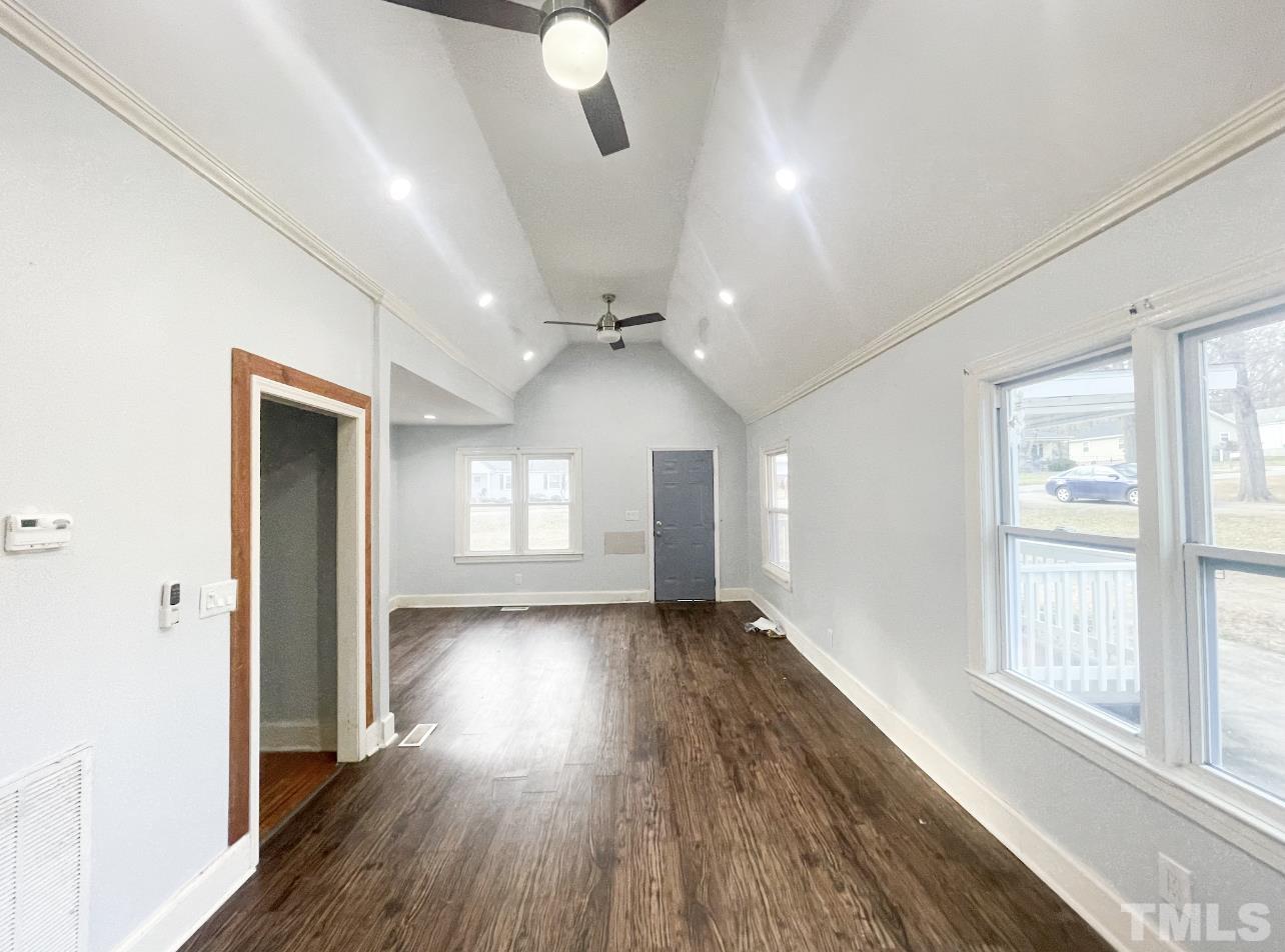1240 Pointer Street Roxboro, NC 27573 - Photo 7 of 20 wooden floor in an empty room with a window