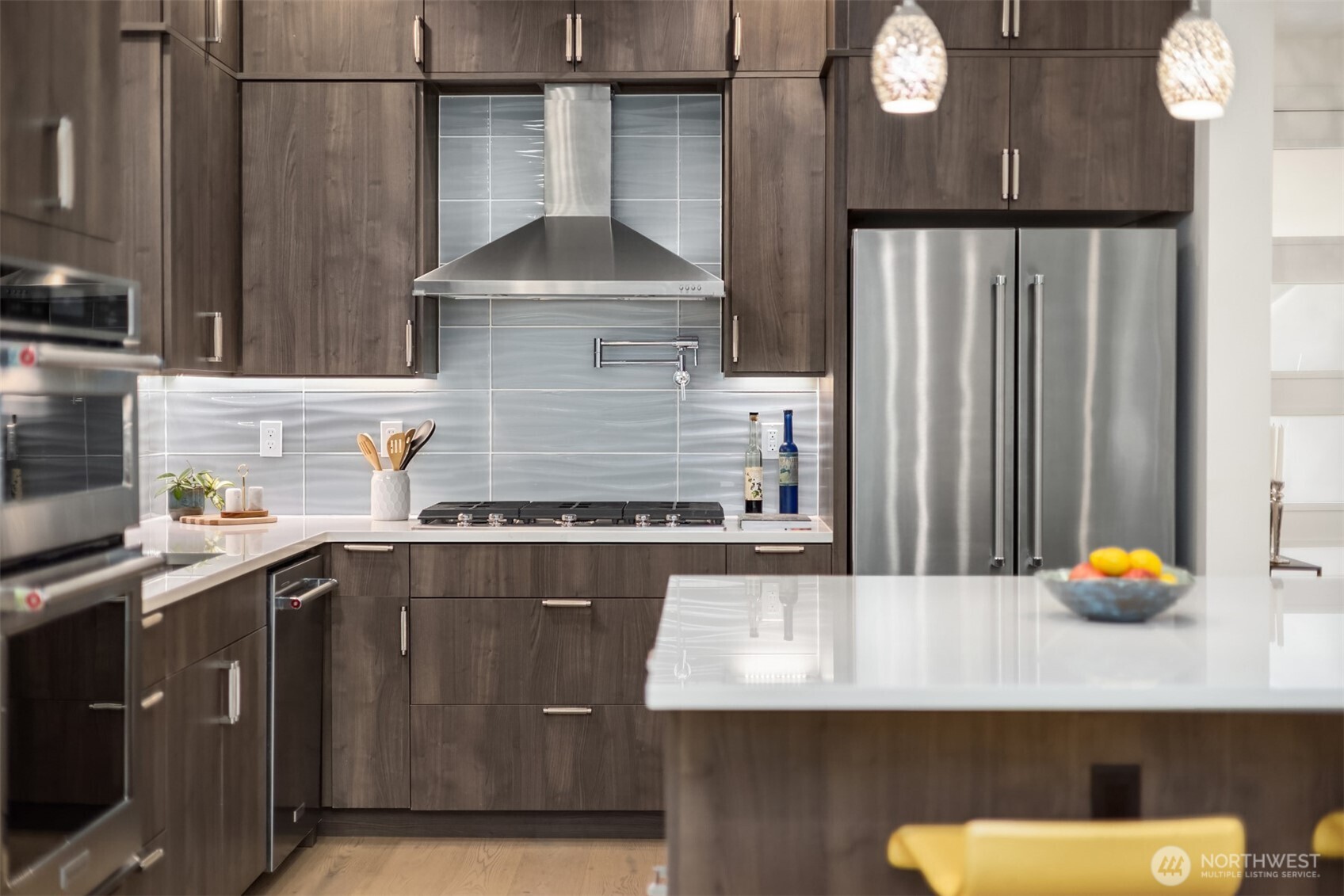 13532 Phelps Road Northeast Bainbridge Island, WA 98110 - Photo 13 of 35 an outdoor kitchen with a sink a counter and cabinets