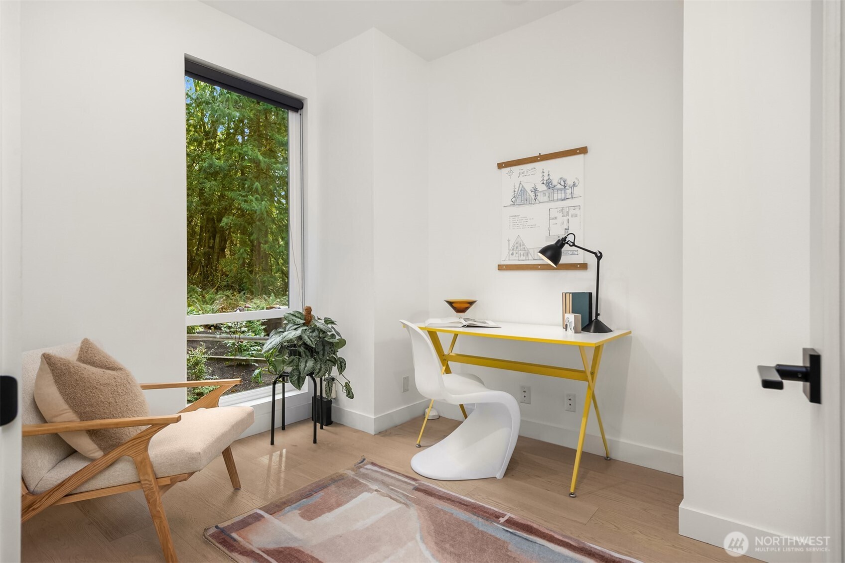 13532 Phelps Road Northeast Bainbridge Island, WA 98110 - Photo 20 of 35 a living room with furniture and a potted plant