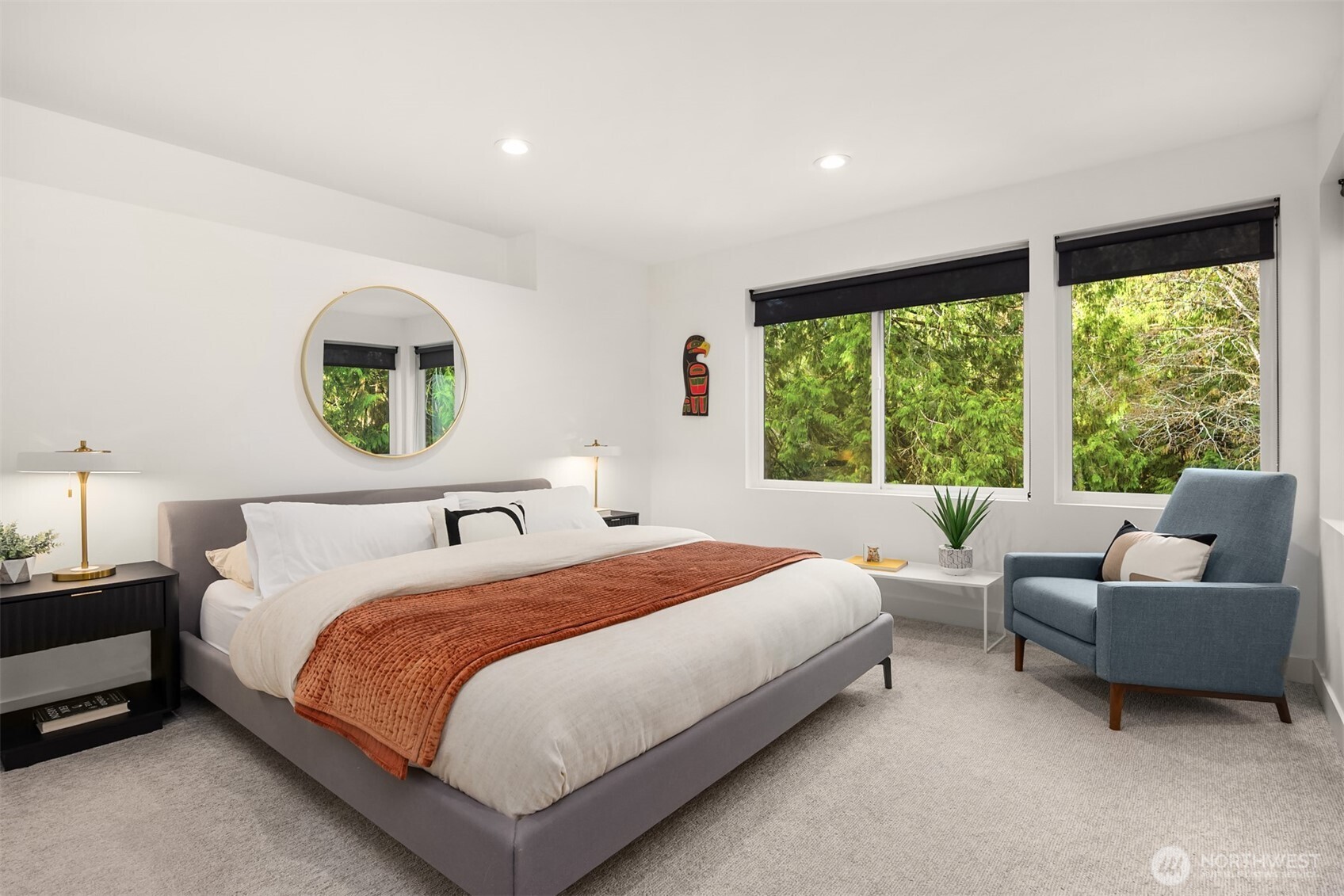 13532 Phelps Road Northeast Bainbridge Island, WA 98110 - Photo 22 of 35 a bedroom with a bed and a large window