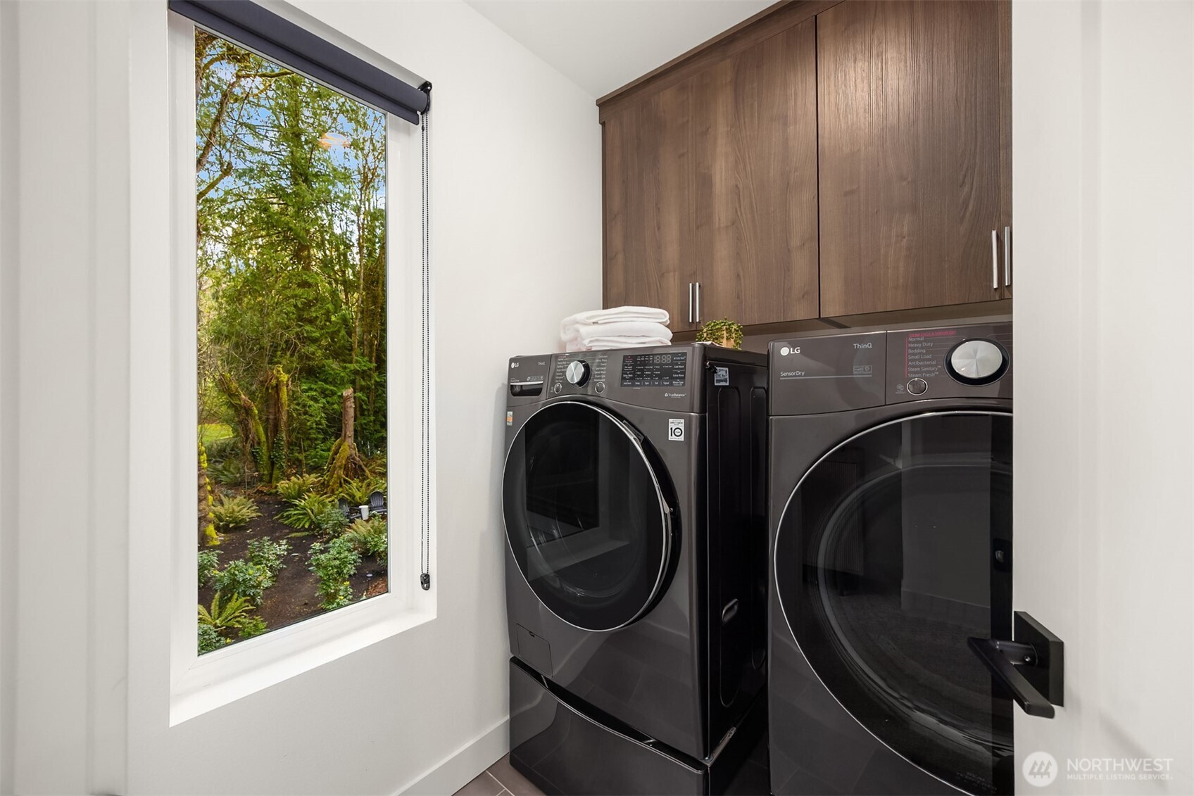 13532 Phelps Road Northeast Bainbridge Island, WA 98110 - Photo 29 of 35 a utility room with dryer and washer