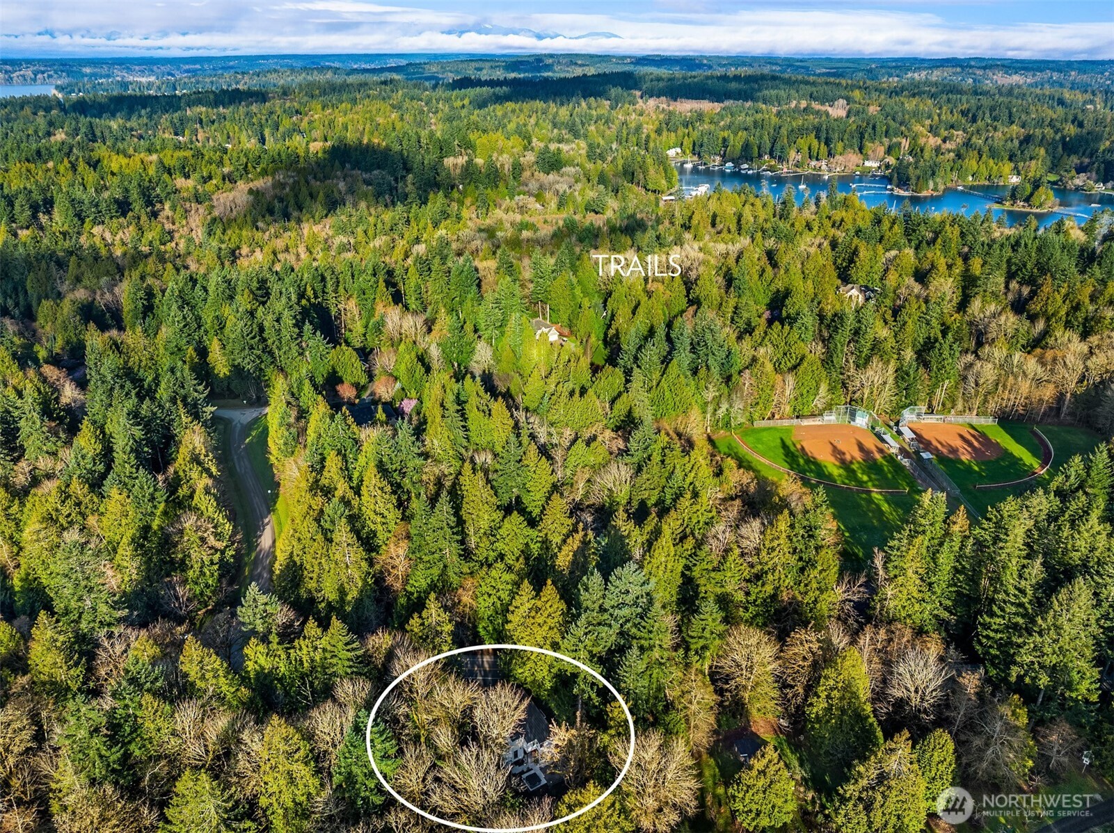 13532 Phelps Road Northeast Bainbridge Island, WA 98110 - Photo 35 of 35 a view of a yard with wooden fence