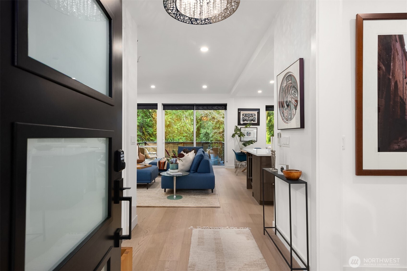 13532 Phelps Road Northeast Bainbridge Island, WA 98110 - Photo 4 of 35 a living room with furniture and a large window