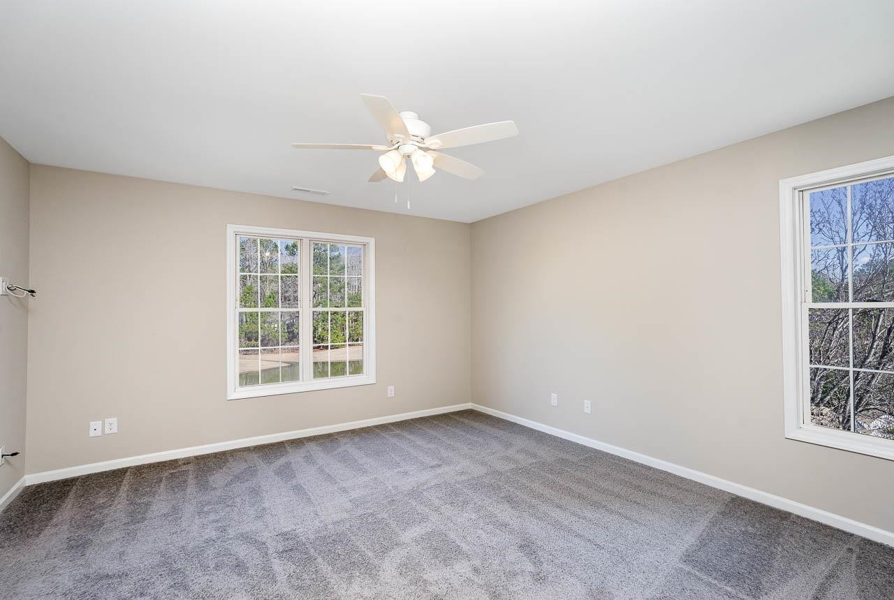 8409 Neuse Timbers Court Raleigh, NC 27616 - Photo 17 of 30 Second Floor Primary Bedroom w/custom new carpets, ceiling fan, ensuite, walk in Closet..waterview Primary Bedroom