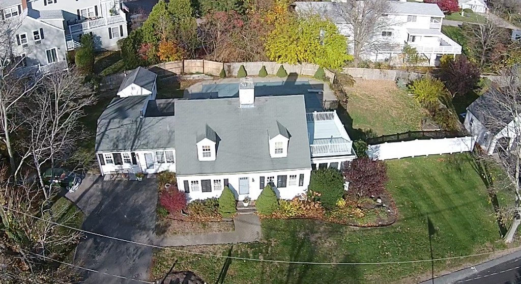 24 Wellesley Road Scituate, MA 02066 - Photo 3 of 28 an aerial view of a house with a yard