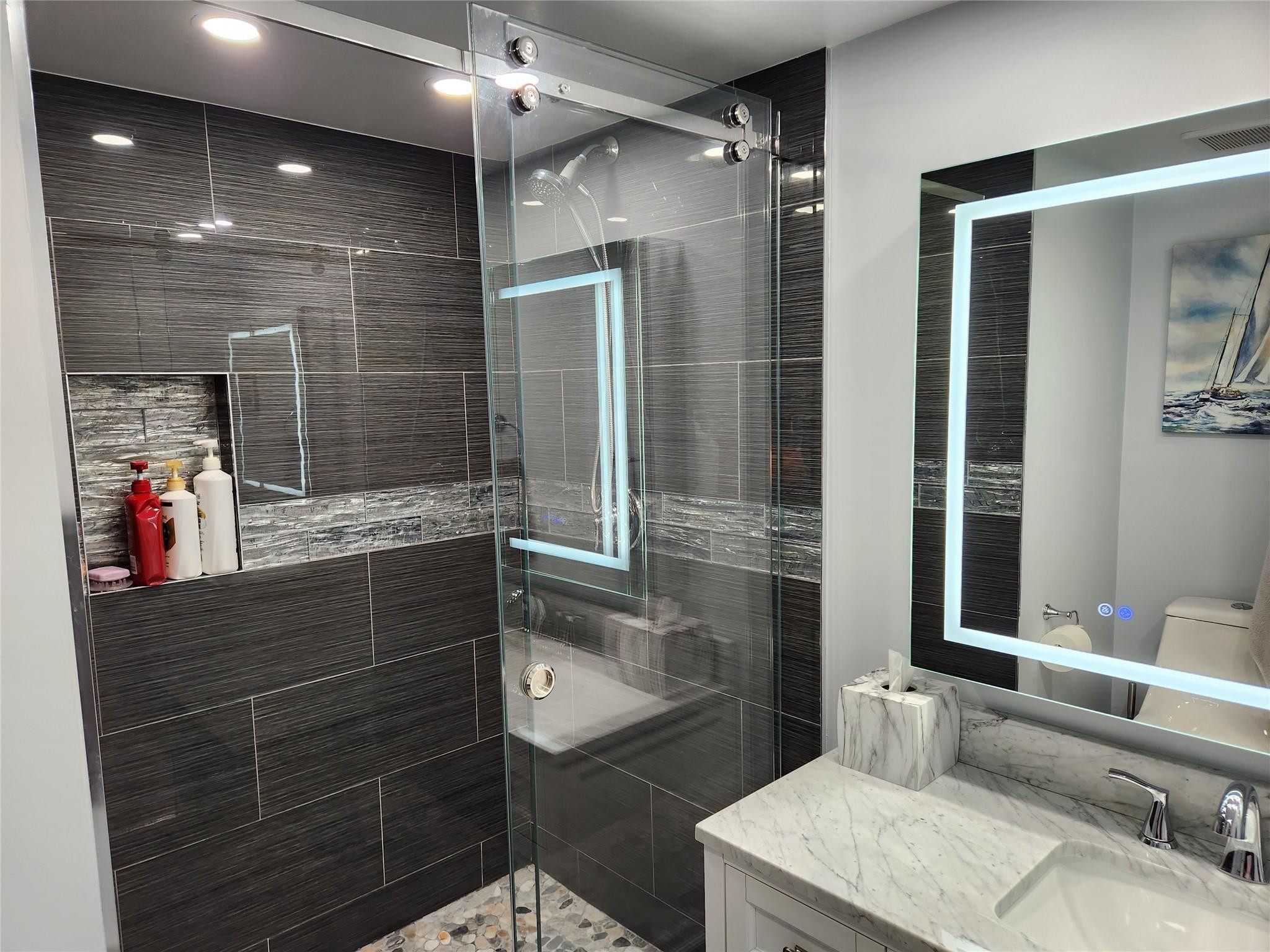 16100 Golf Club Road, Unit 301 Weston, FL 33326 - Photo 16 of 22 Newly remodeled second bathroom