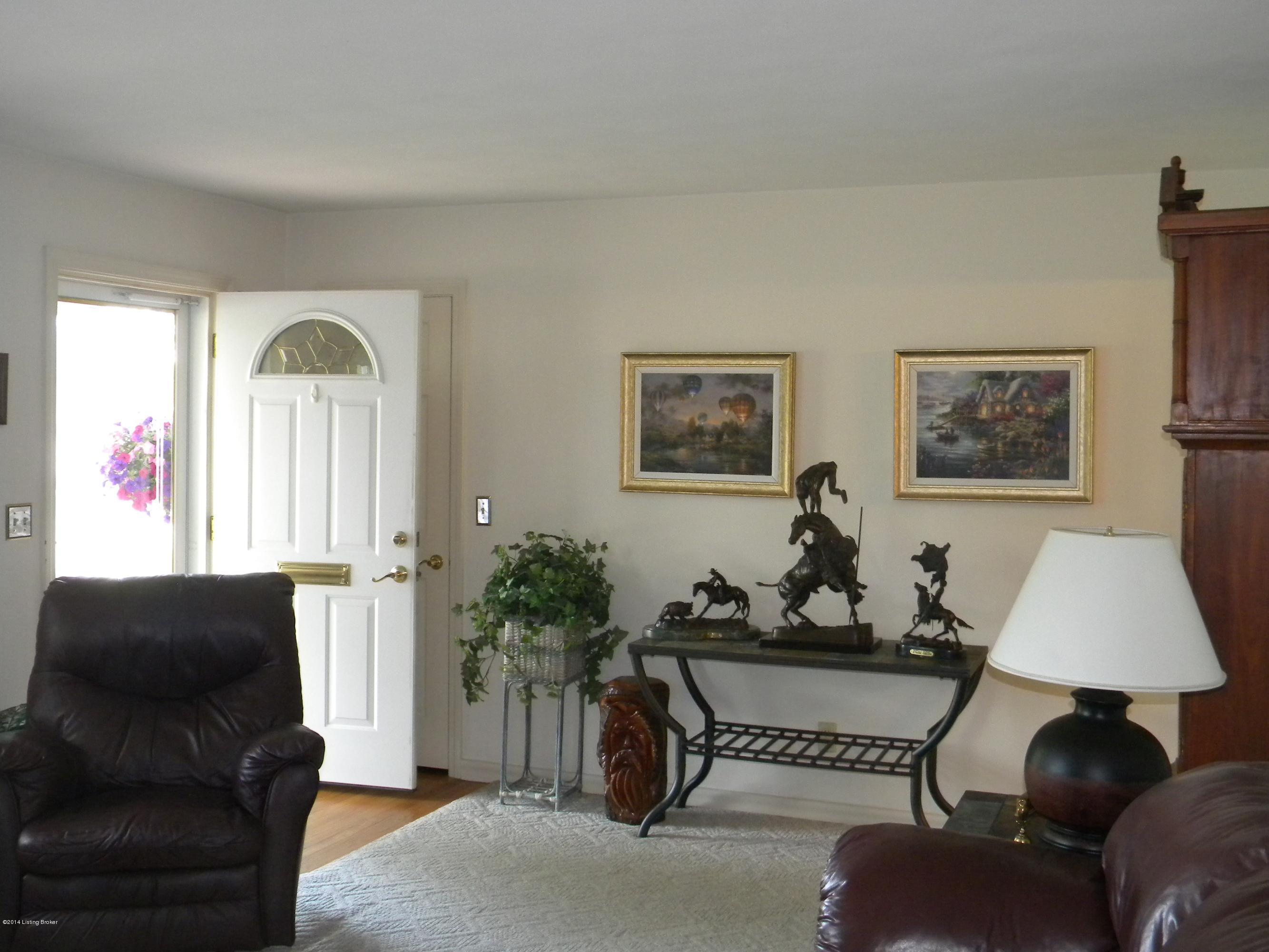 8305 Smithton Road Louisville, KY 40219 - Photo 6 of 28 Spacious Living Room With Hardwood Floors