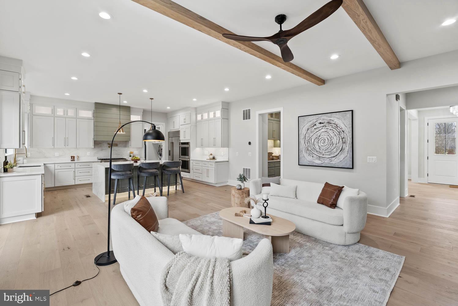 402 Marshall Road Southwest Vienna, VA 22180 - Photo 12 of 78 a living room with furniture and kitchen view