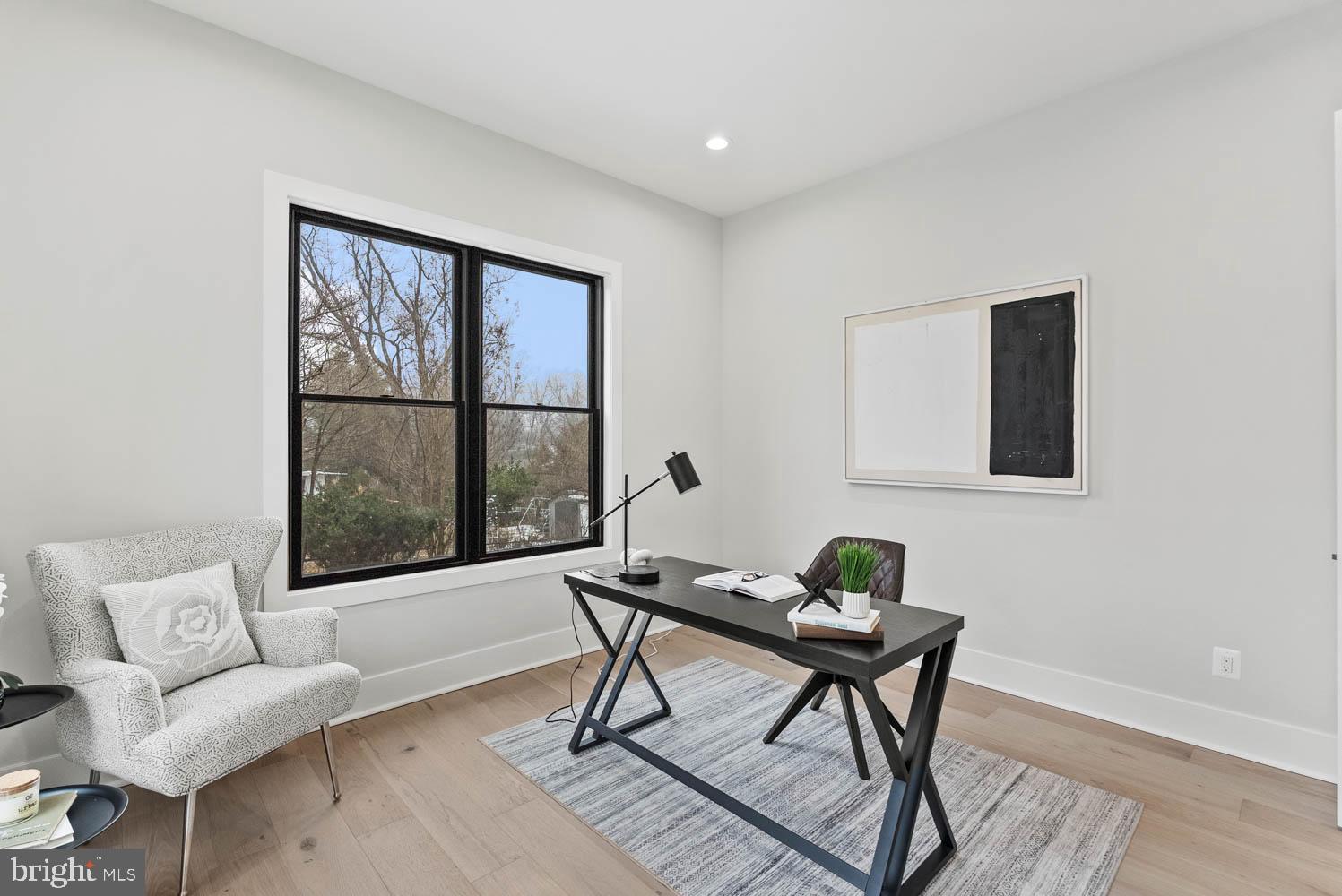 402 Marshall Road Southwest Vienna, VA 22180 - Photo 24 of 78 a living room with furniture and a window