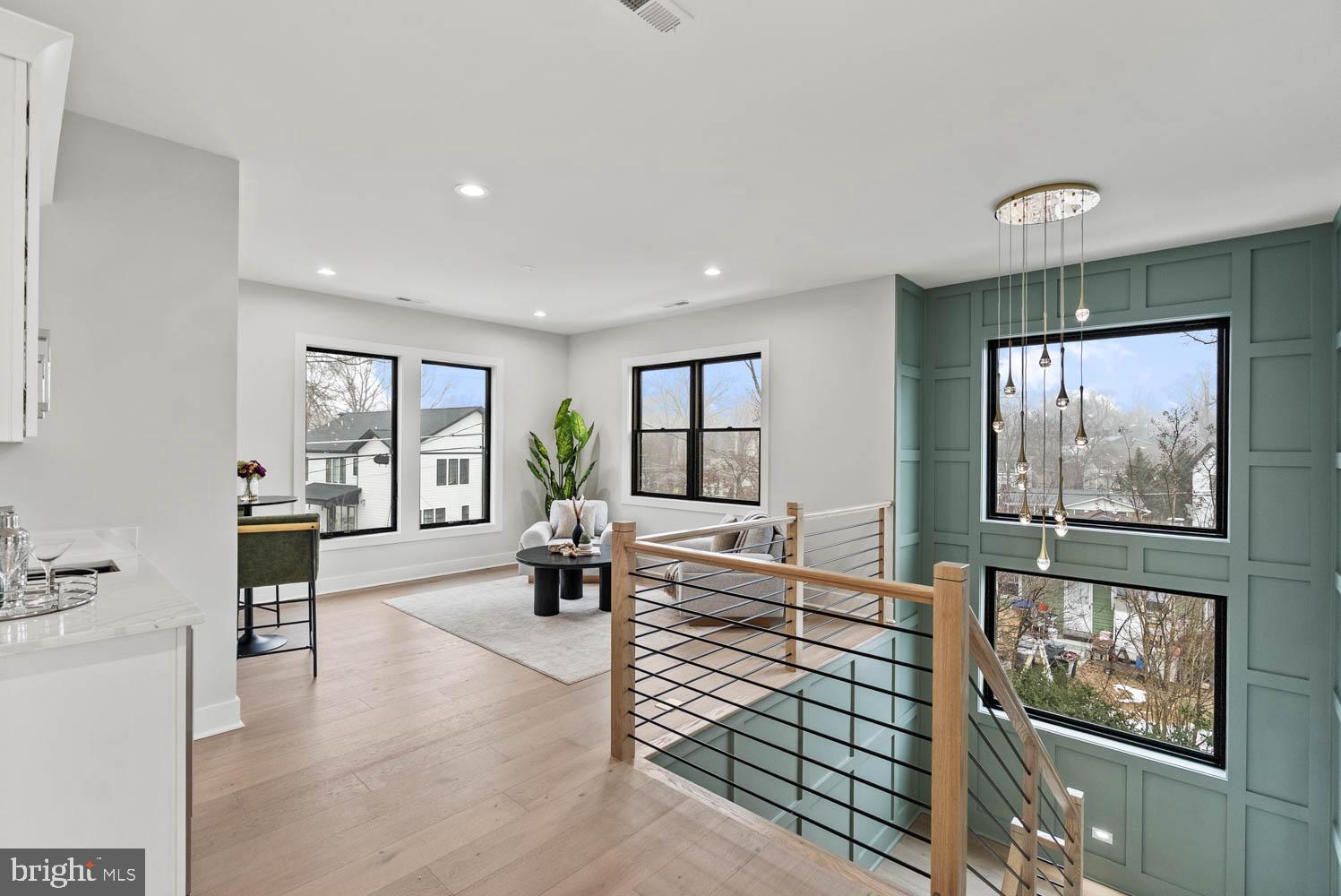 402 Marshall Road Southwest Vienna, VA 22180 - Photo 31 of 78 a living room with furniture and a flat screen tv