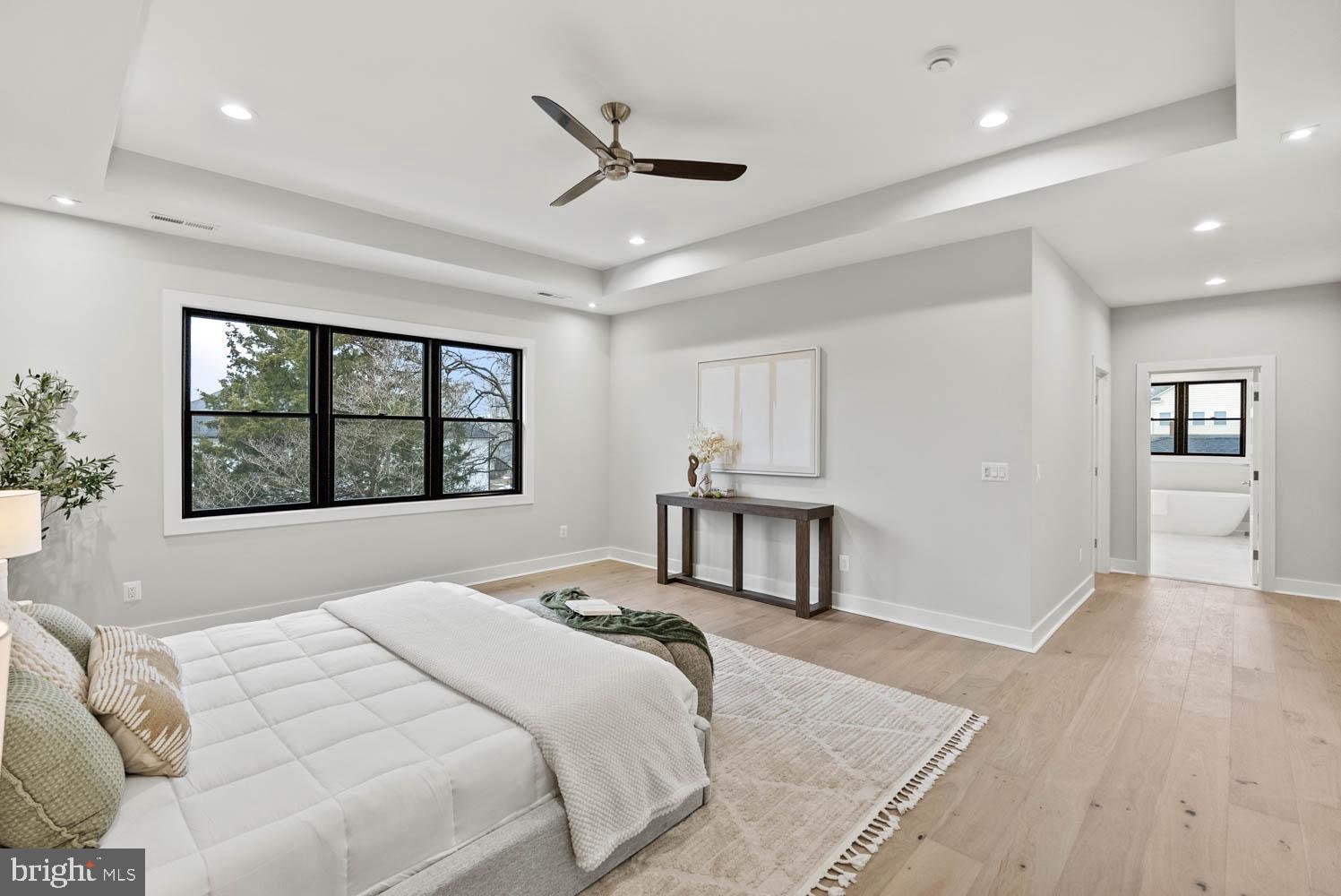 402 Marshall Road Southwest Vienna, VA 22180 - Photo 38 of 78 a bedroom with a bed and a window