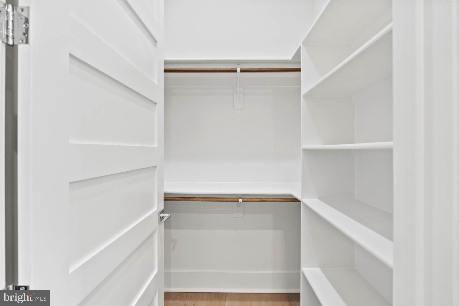 402 Marshall Road Southwest Vienna, VA 22180 - Photo 46 of 78 a view of walk in closet with empty racks