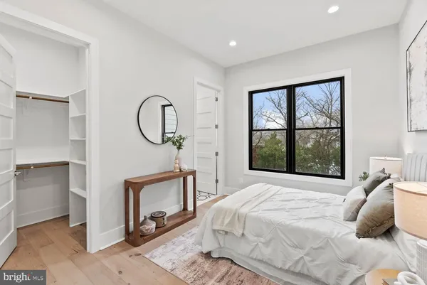 a view of balcony with wooden floor and fence