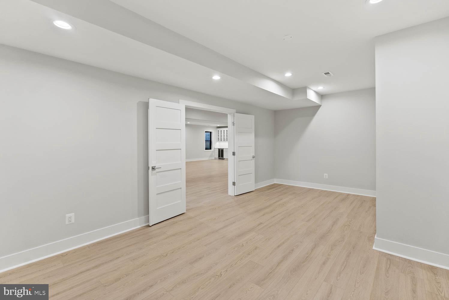 402 Marshall Road Southwest Vienna, VA 22180 - Photo 67 of 78 a view of a kitchen with a sink and wooden floor