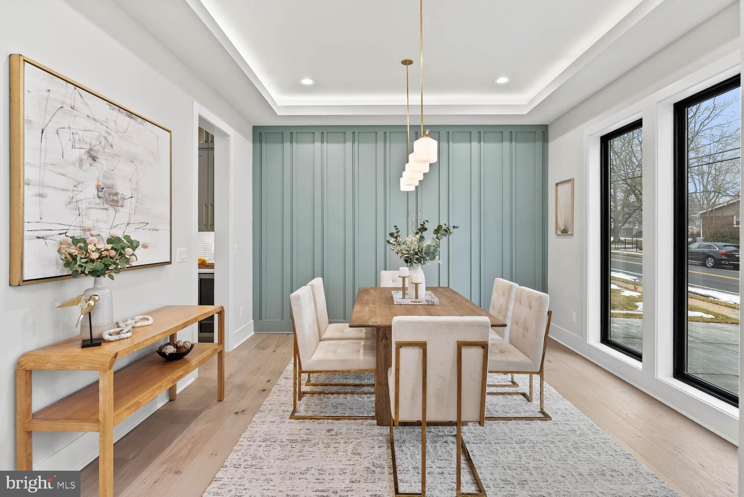 402 Marshall Road Southwest Vienna, VA 22180 - Photo 7 of 78 a view of a dining room with furniture window and wooden floor