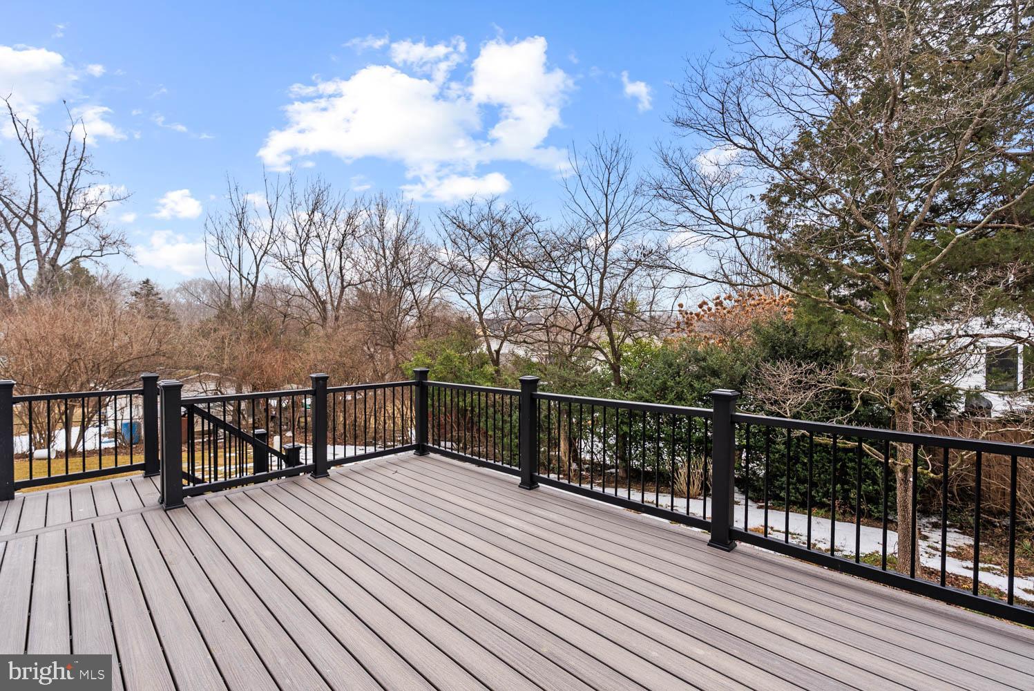 402 Marshall Road Southwest Vienna, VA 22180 - Photo 73 of 78 a view of balcony with wooden floor and fence