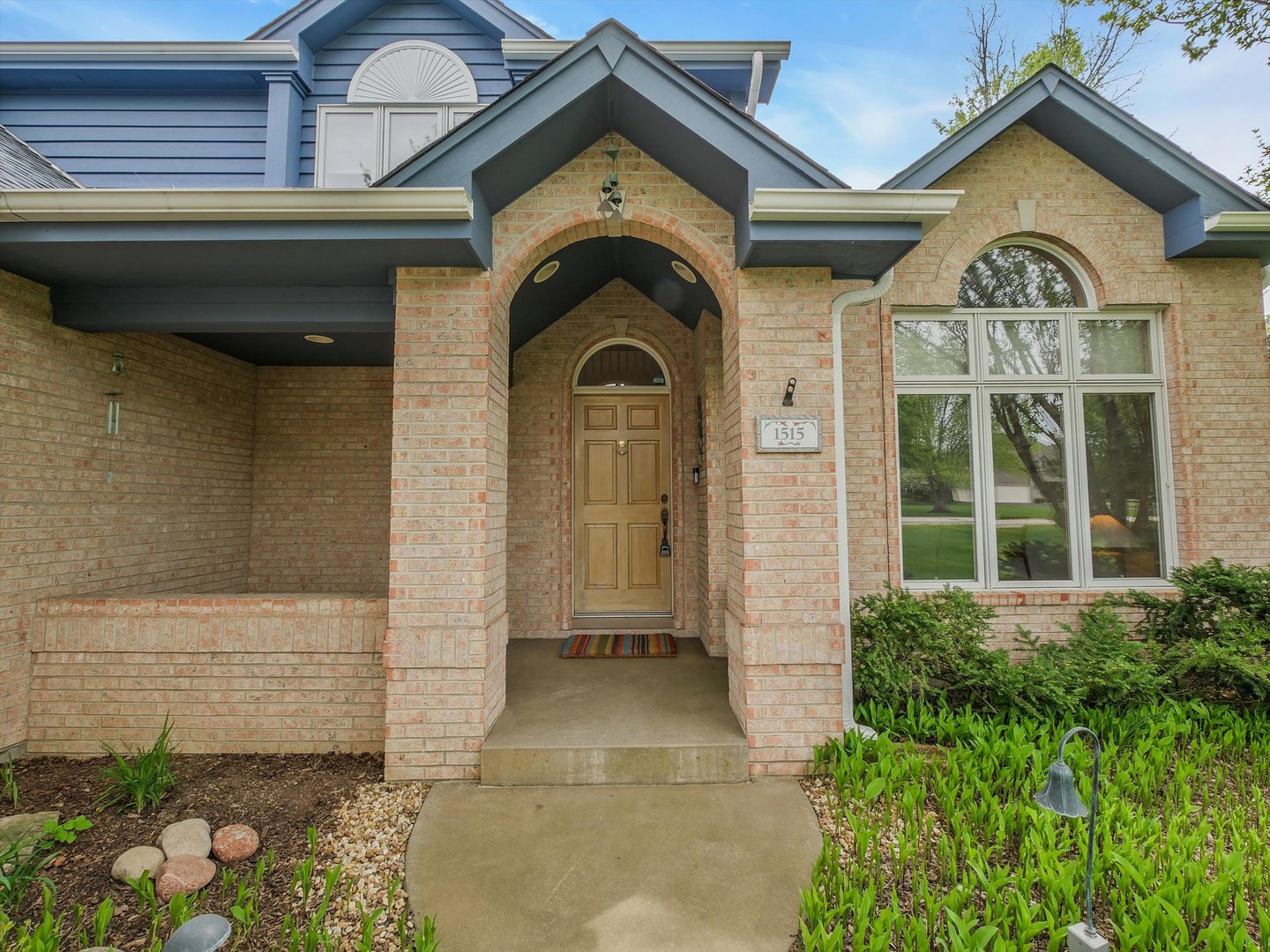 1515 Pine Street Spring Grove, IL 60081 - Photo 13 of 38 a view of a brick house with a large windows