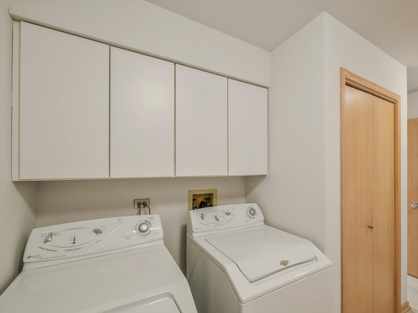 1515 Pine Street Spring Grove, IL 60081 - Photo 26 of 38 a view of storage and utility room with washer and dryer