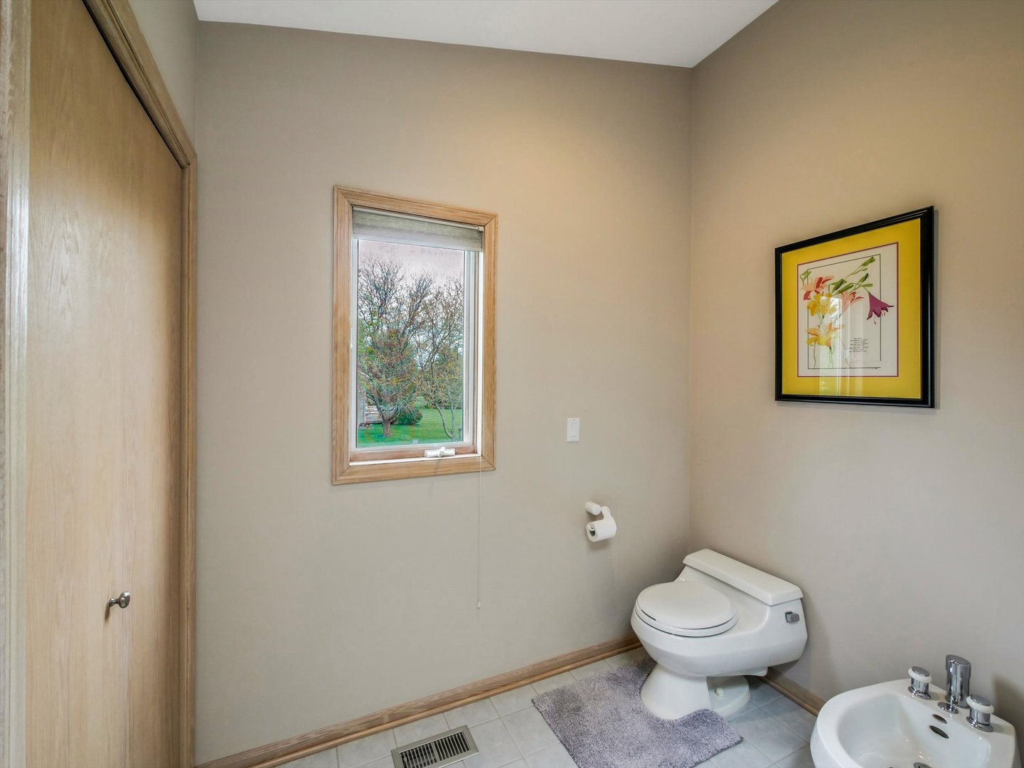 1515 Pine Street Spring Grove, IL 60081 - Photo 36 of 38 a white toilet sitting next to a bathroom sink