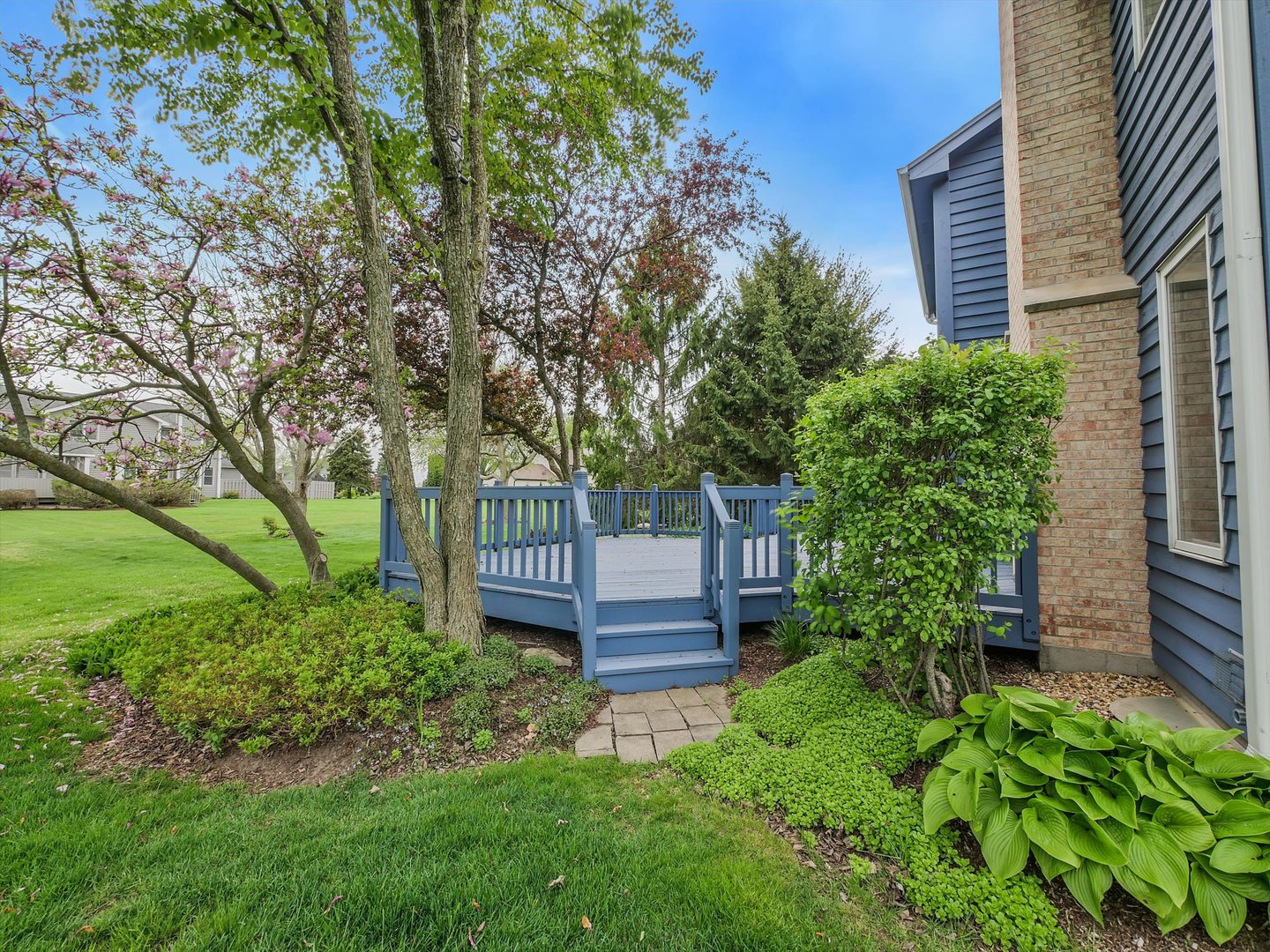 1515 Pine Street Spring Grove, IL 60081 - Photo 7 of 38 a view of a house with a yard and plants