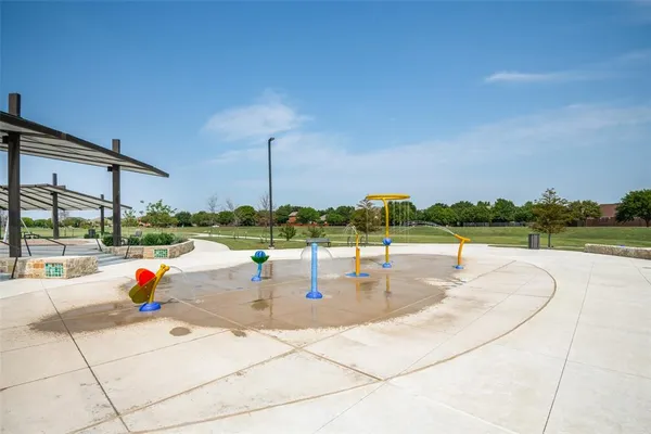 a view of swimming pool with outdoor seating