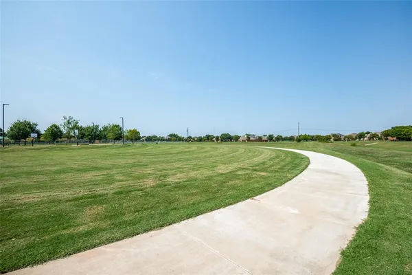 a view of a water and a field