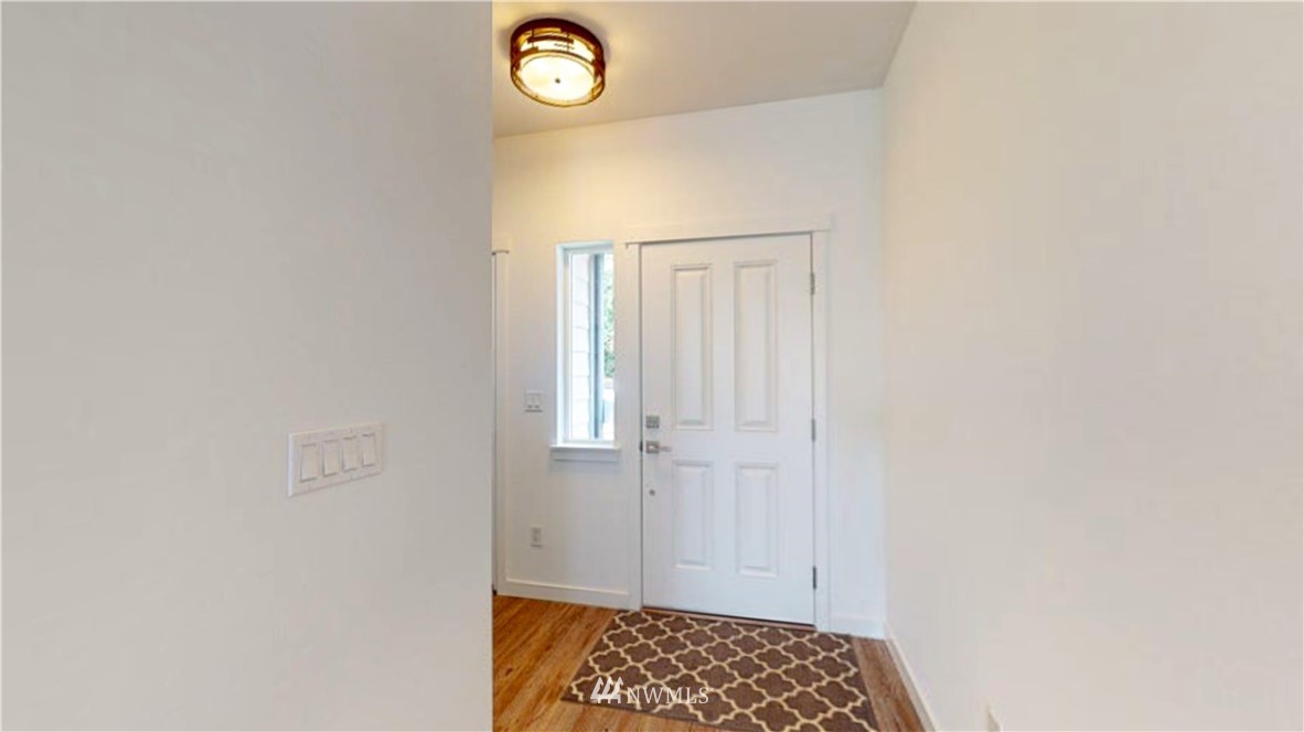 4861 Talbot Road South, Unit B3 Renton, WA 98055 - Photo 20 of 36 a view of walk in closet with window