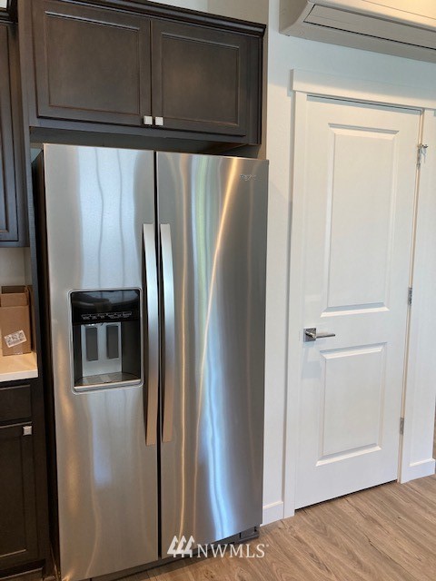 4861 Talbot Road South, Unit B3 Renton, WA 98055 - Photo 10 of 36 a view of a refrigerator in kitchen and a refrigerator