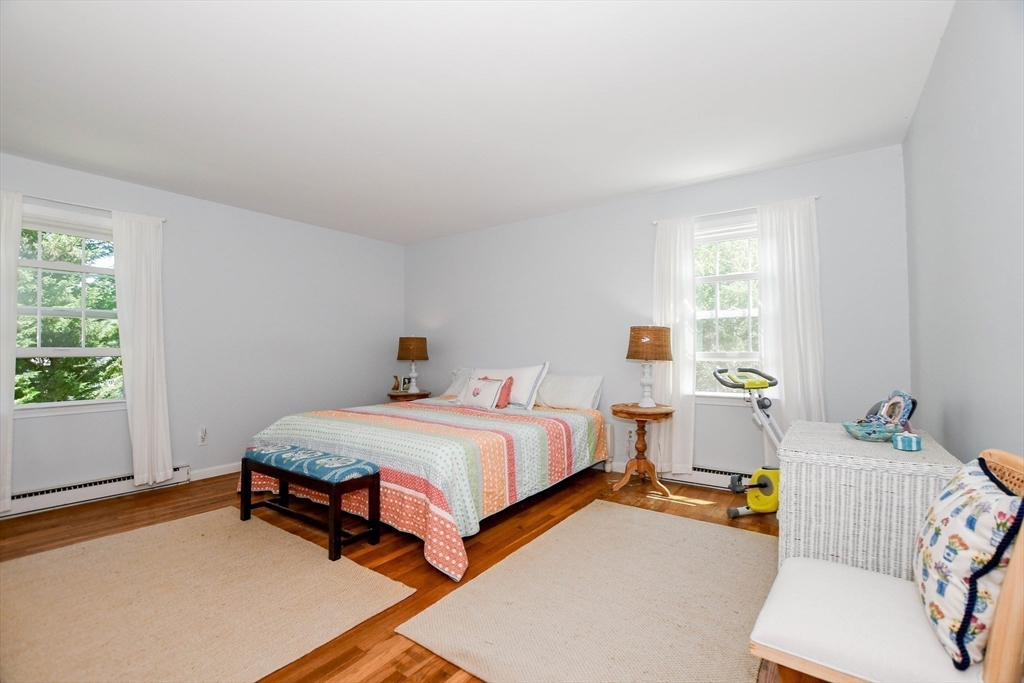 17 Olde Knoll Road Marion, MA 02738 - Photo 28 of 38 a bedroom with a bed and a window