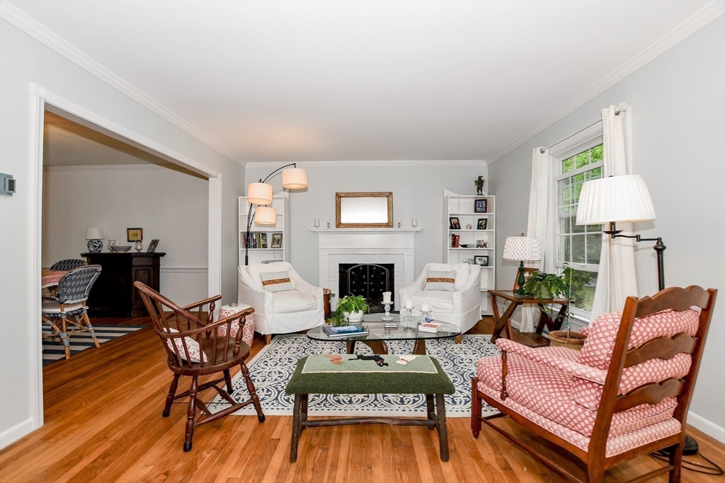17 Olde Knoll Road Marion, MA 02738 - Photo 7 of 38 a living room with furniture fireplace and wooden floor