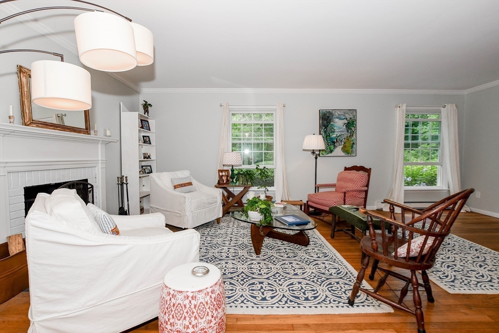 17 Olde Knoll Road Marion, MA 02738 - Photo 8 of 38 a living room with furniture and a fireplace