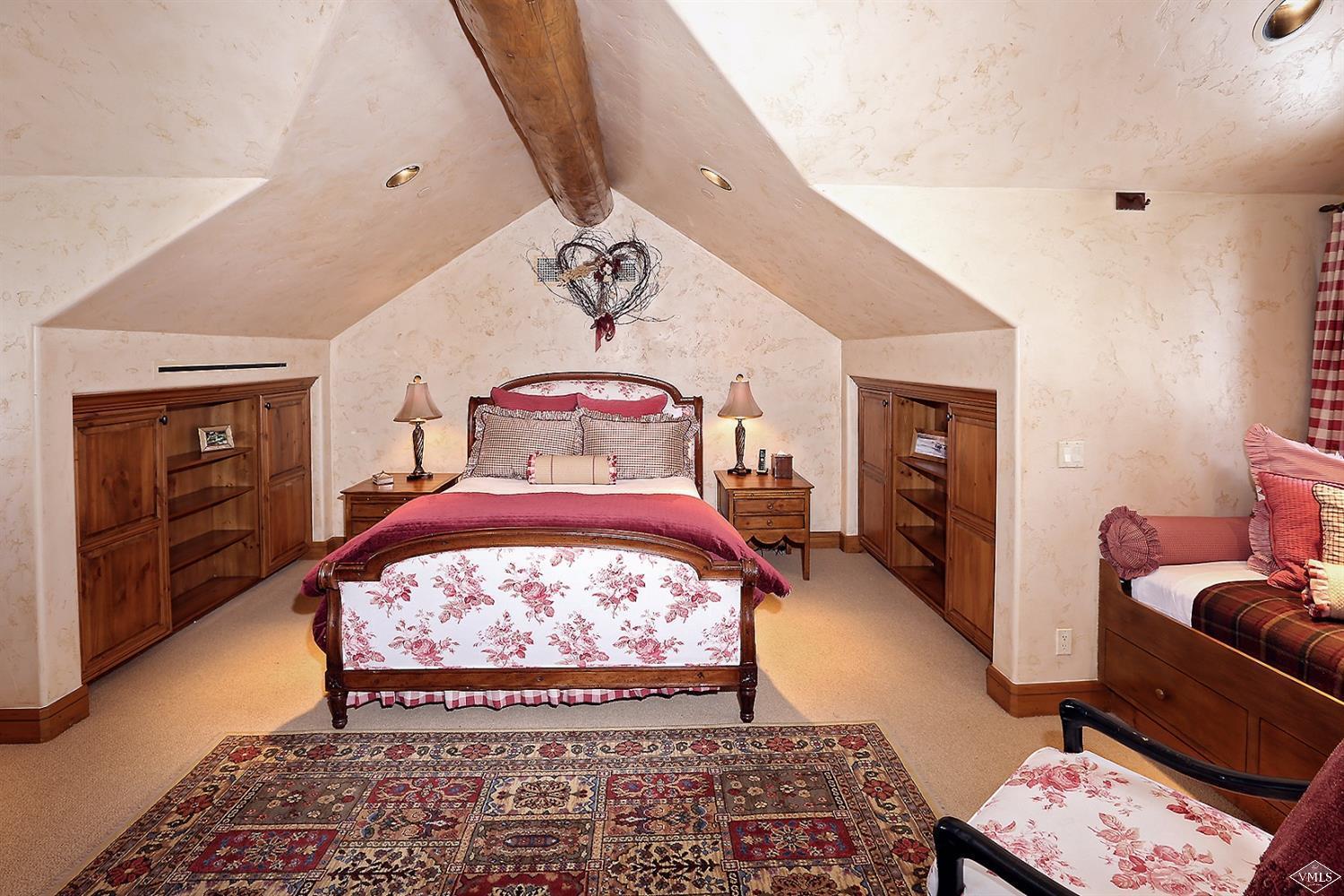 880 Daybreak Ridge Road Beaver Creek, CO 81620 - Photo 19 of 24 a living room with furniture and a rug
