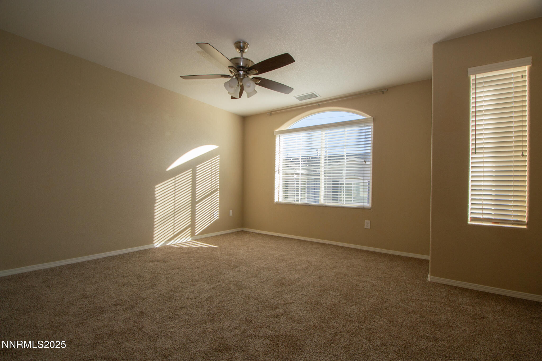 3116 Sterling Ridge Circle Sparks, NV 89431 - Photo 9 of 20 a view of an empty room with a window