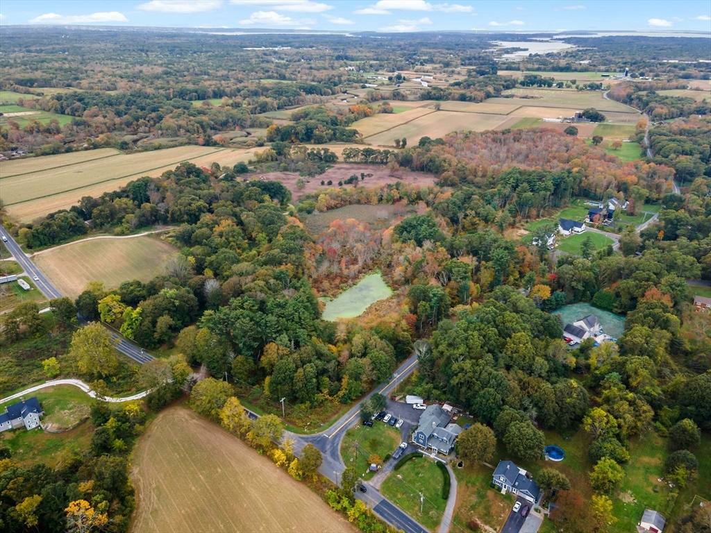 11 Barney Avenue Rehoboth, MA 02769 - Photo 2 of 10 an aerial view of a city with lots of residential buildings