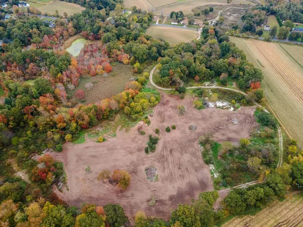 an aerial view of residential house with outdoor space
