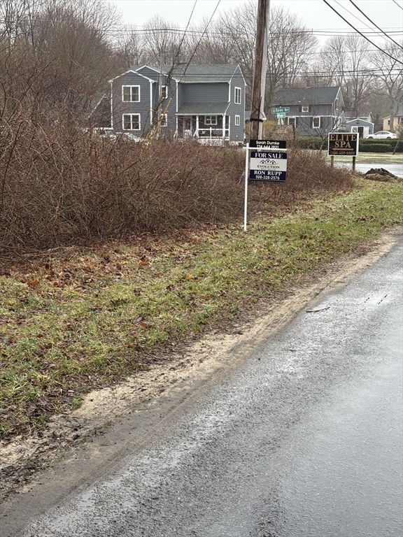 11 Barney Avenue Rehoboth, MA 02769 - Photo 10 of 10 a backyard of a house with garden and trees