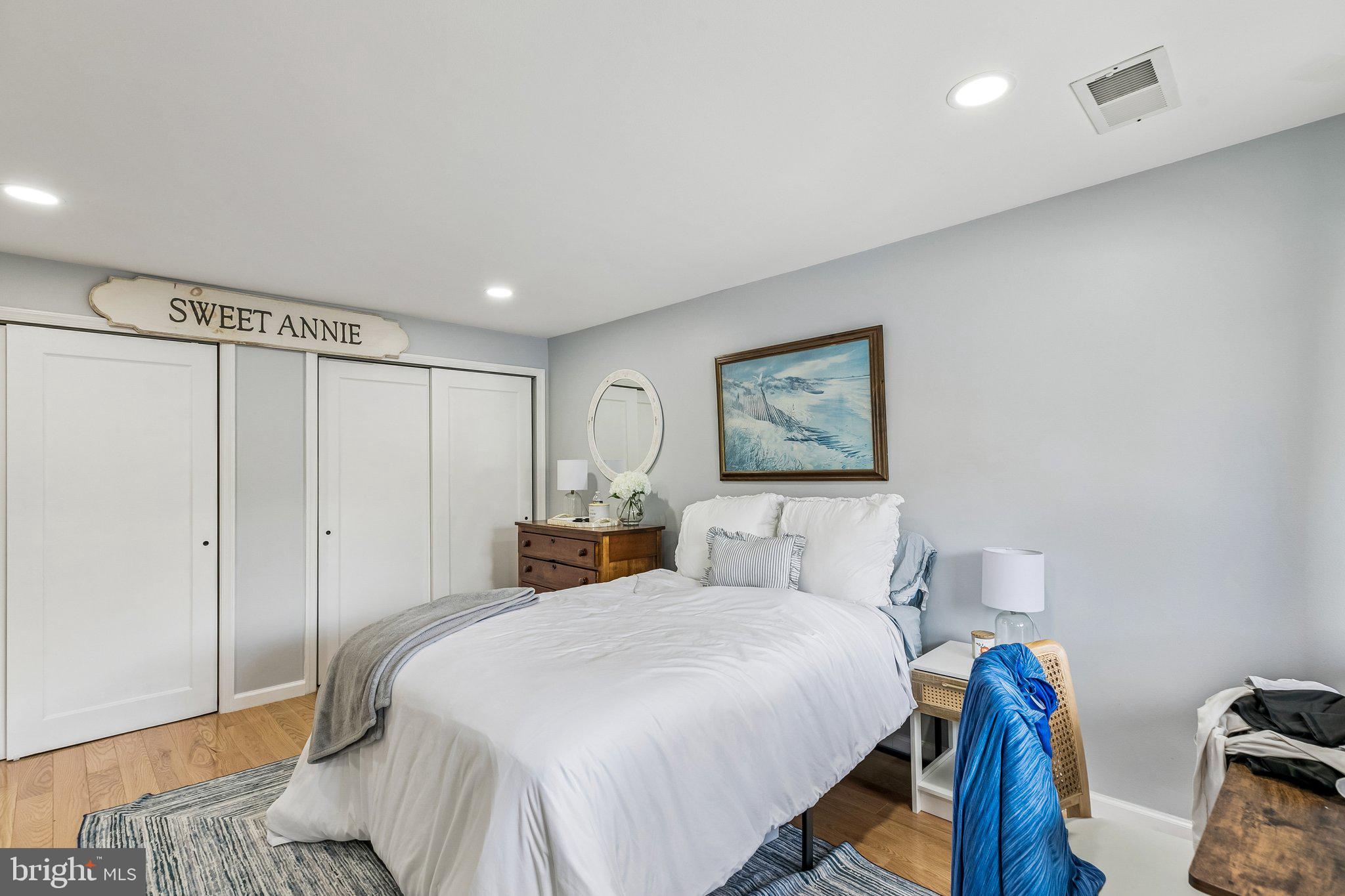 1130 Lombard Street Philadelphia, PA 19147 - Photo 17 of 45 a spacious bedroom with a bed and a tv