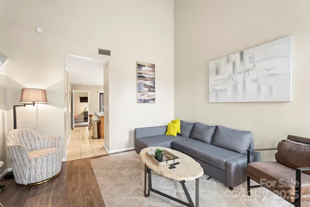 a living room with furniture and a couch