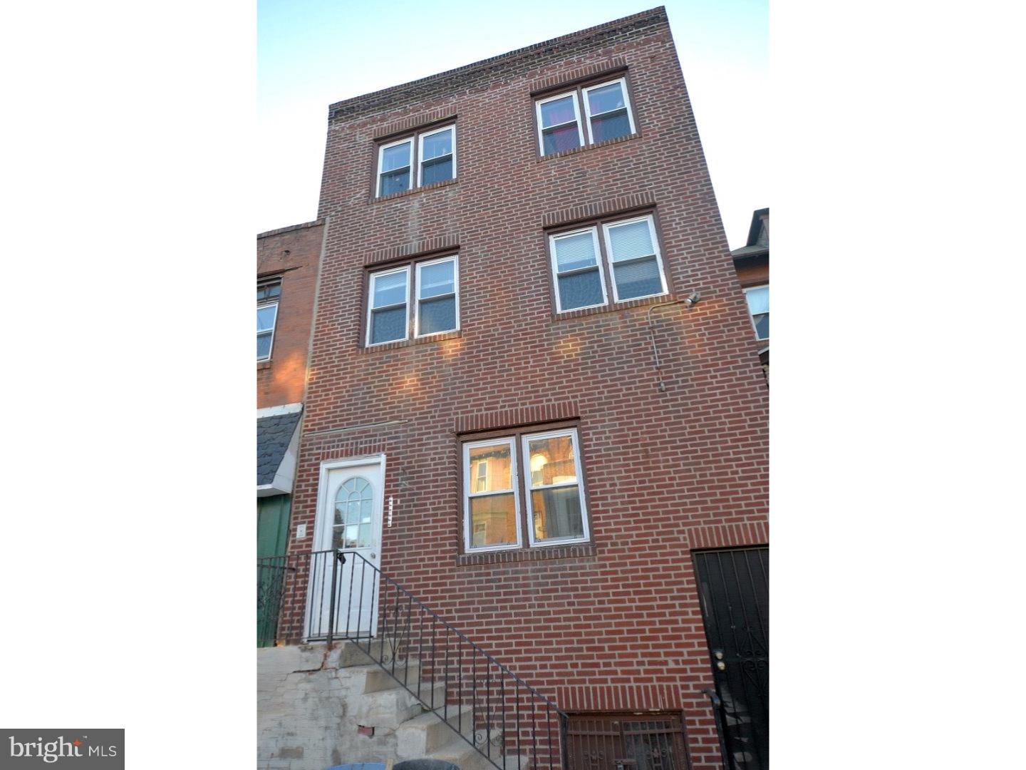 a brick building with a large windows