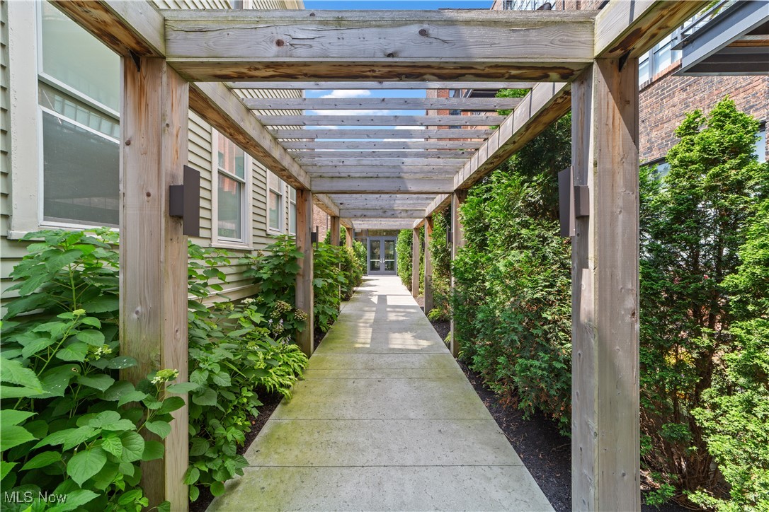 2048 Fulton Road, Unit 107 Cleveland, OH 44113 - Photo 5 of 37 Main entry walkway with pergola