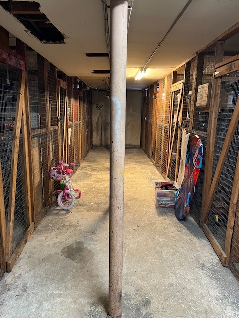 100 Silliman Street, Unit 1B Fairfield, CT 06824 - Photo 22 of 25 a view of a garage with rack and bicycle