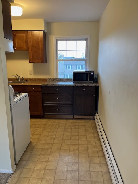 100 Silliman Street, Unit 1B Fairfield, CT 06824 - Photo 7 of 25 a bathroom with a bathtub and a sink