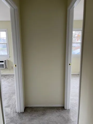 a view of an empty room and window